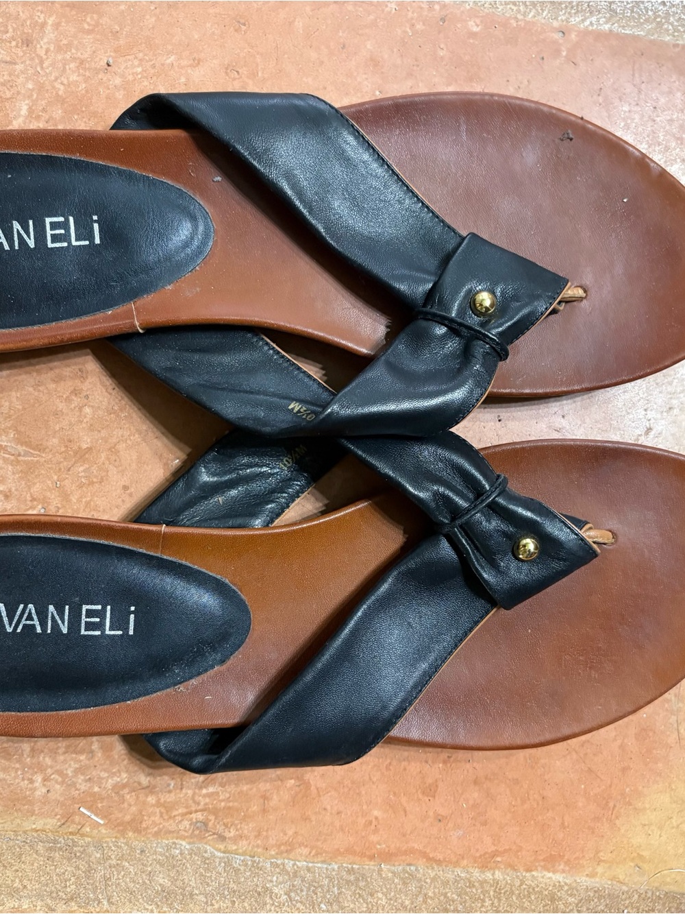 Vaneli Black Leather Thong Sandals with Gold Accent